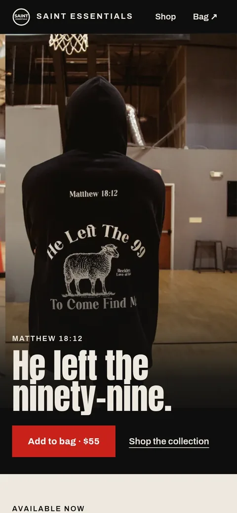 Saint Essentials' new site on a phone: the black He Left the 99 hoodie worn from behind in a gym, with 'He left the ninety-nine.' and a red Add to bag button.